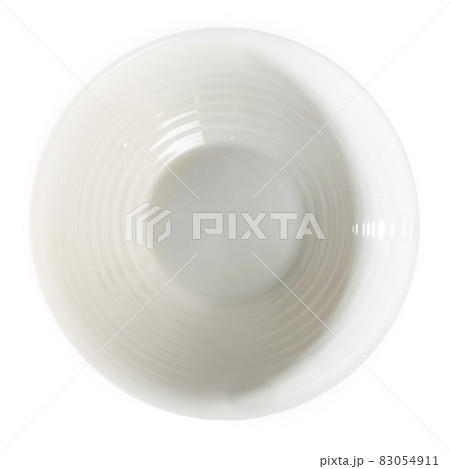 Top view of white round plate isolated on white background Top view of white round plate isolated on white background 83054911