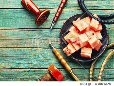 Tobacco shisha for smoking with watermelon Tobacco shisha for smoking with watermelon 83064820