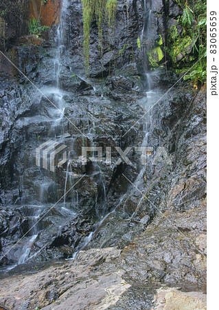 a Beautiful Waterfall at the peak, hong kong 83065659