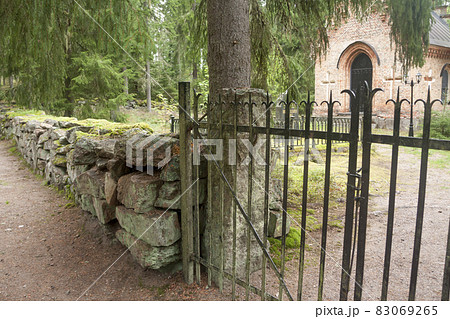 Black fence at old chapel at Wrede family cemetery. 4 September 2018 - Anjala, Kouvola, Finland. 83069265