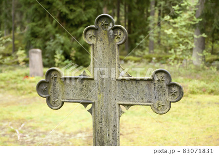 Cross at old beautiful semetery in Finland. 83071831