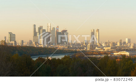 Moscow cityscape during autumn day. Skyscrapers of the modern Moscow International Business center (MIBC). Wide perspective. Moskva river and public park Moscow cityscape during autumn day. Skyscrapers of the modern Moscow International Business center (MIBC). Wide perspective. Moskva river and public park 83072240