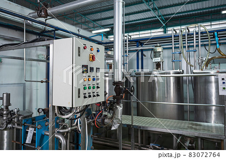 Control panel of stainless pipeline and tanks system at beverage processing plant Control panel of stainless pipeline and tanks system at beverage processing plant 83072764