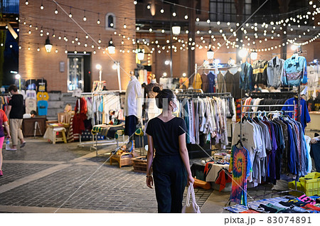 Series photo of young women shopping in night street market , Chaing mai north of thailand Series photo of young women shopping in night street market , Chaing mai north of thailand 83074891
