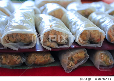 Layers of gluten free spring rolls made at home 83076243