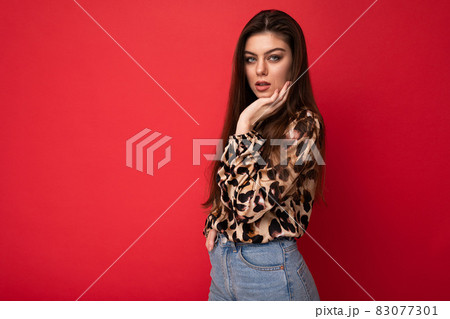 Close-up portrait of young nice-looking attractive lovely glamorous brunet woman wearing leopard Close-up portrait of young nice-looking attractive lovely glamorous brunet woman wearing leopard 83077301
