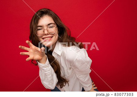 Photo of young positive happy smiling beautiful woman with sincere emotions wearing stylish clothes Photo of young positive happy smiling beautiful woman with sincere emotions wearing stylish clothes 83077303