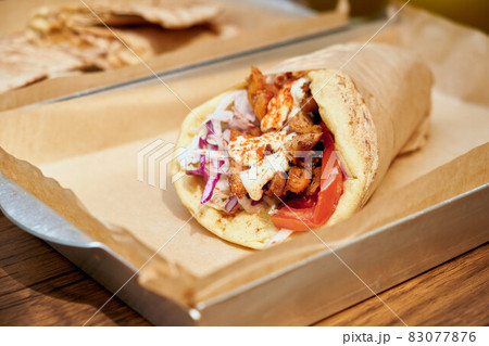 Vegetarian gyros on a metal tray. Food in Greece. 83077876