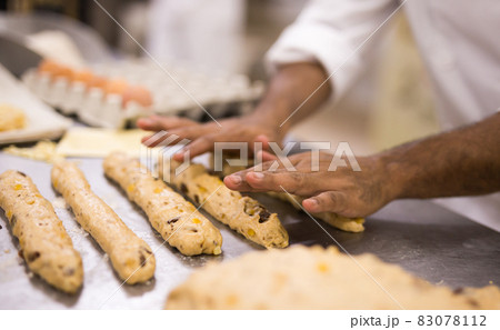 Closeup shot of making sweet buns with dough 83078112