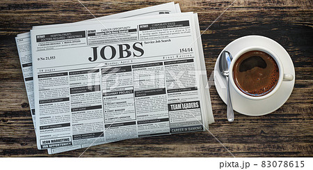 Job classifieds ads newspaper and coffee cup on wooden table. Job search concept. 83078615