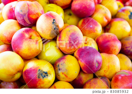 Closeup view on ripe nectarines on grocery store Closeup view on ripe nectarines on grocery store 83085932