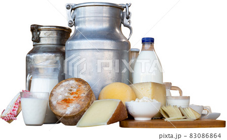 Dairy products and milk cans in the hayloft 83086864