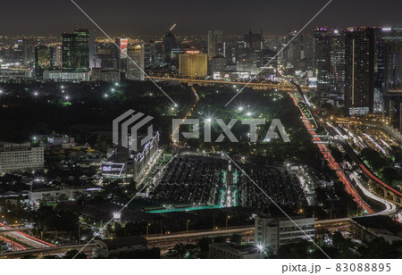 Aerial view of Bang Sue central station with skyscrapers background at night. 83088895