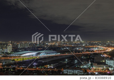 Aerial view of Bang Sue central station with skyscrapers background at night. 83088910