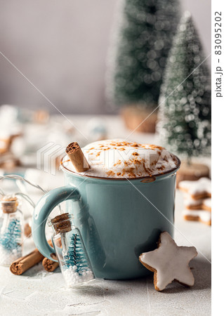 Cup of hot chocolate and gingerbread stars cookies Cup of hot chocolate and gingerbread stars cookies 83095202