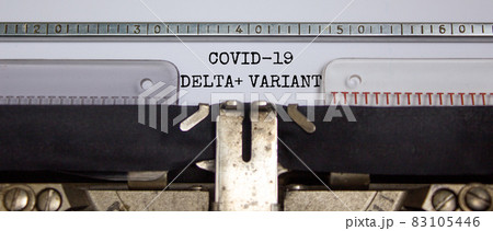 Covid-19 delta plus virus variant symbol. Words 'Covid-19 delta plus variant' typed on retro typewriter. Medical and COVID-19 new delta plus variant concept. 83105446
