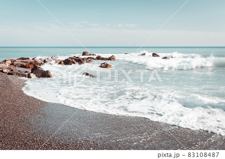 Beautyful seashore with boulders in Ventimiglia in Italy Beautyful seashore with boulders in Ventimiglia in Italy 83108487