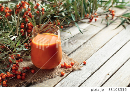 Sea buckthorn juice with fresh berries. Sea buckthorn juice with fresh berries. 83108556