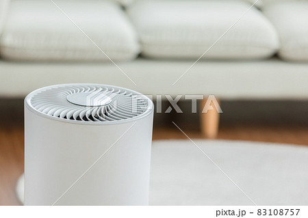 Close up Air purifier in cozy white living room for filter and cleaning removing dust PM2.5 HEPA and virus in home,for fresh air and healthy Wellness life,Air Pollution Concept Close up Air purifier in cozy white living room for filter and cleaning removing dust PM2.5 HEPA and virus in home,for fresh air and healthy Wellness life,Air Pollution Concept 83108757