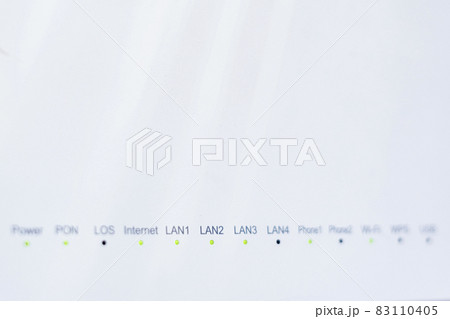 Close-up view of Internet wi-fi router device. Icons on the Wi-Fi router indicating the signal and connection. Wi-Fi modem router. Fast internet modem device Close-up view of Internet wi-fi router device. Icons on the Wi-Fi router indicating the signal and connection. Wi-Fi modem router. Fast internet modem device 83110405