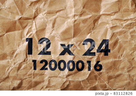 Brown and beige corrugated cardboard and warning signs detail Brown and beige corrugated cardboard and warning signs detail 83112826