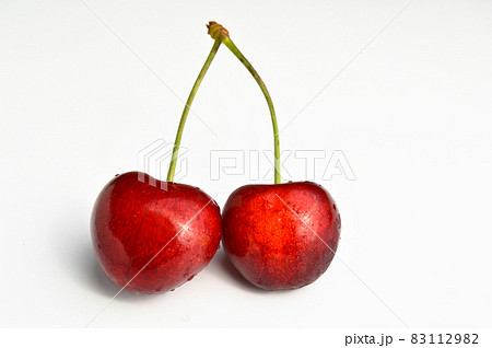 Sweet juicy natural and organic fresh cherry sour cherry, isolated on white background 83112982