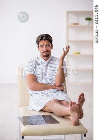 Young male patient waiting for doctor at the hospital 83115046