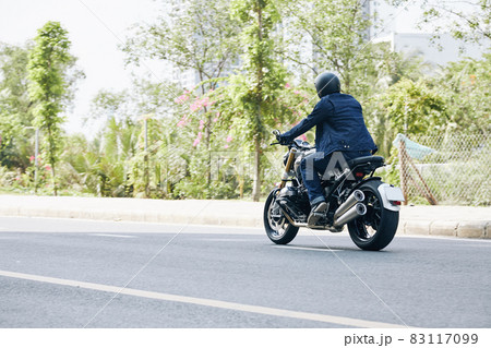 Man Riding on Motorcycle on Highway 83117099