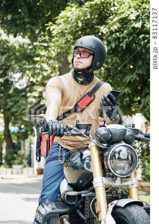 Motorcyclist Delivering Order Motorcyclist Delivering Order 83117137