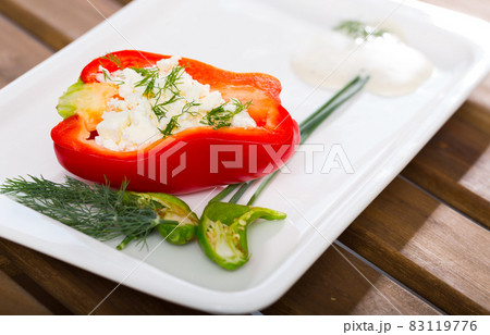 Pepper stuffed with brynza is tasty dish of Bulgarian cuisine 83119776