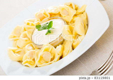 Boiled ravioli with sauce Boiled ravioli with sauce 83119801