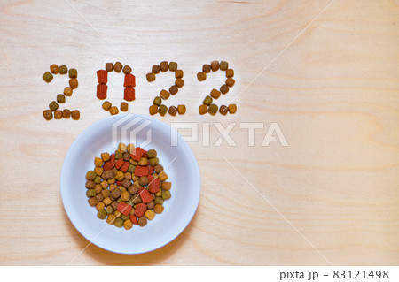 food for cats and dogs and the new year. Dry food label. Pet treats in 2022 83121498