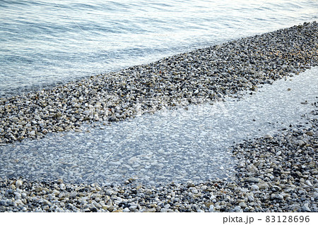 Pebbles on the beach 83128696