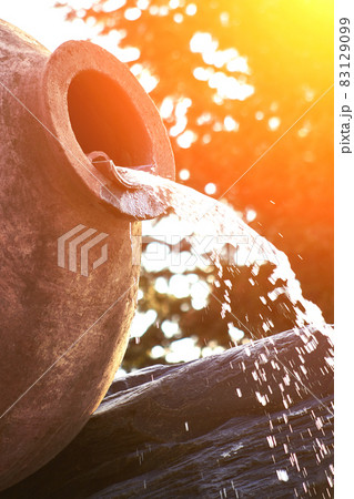 Kvareli, Georgia. Fountains in the form of wine pitcher. Sun flare Kvareli, Georgia. Fountains in the form of wine pitcher. Sun flare 83129099