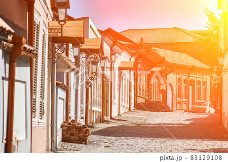 Picturesque street in Sighnaghi (Signagi), Kakheti , Georgia. Sighnaghi is known as a "Love City" in Georgia. Sun flare 83129108
