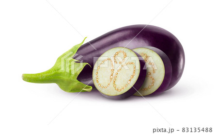 One raw black aubergine and two slices isolated on white background One raw black aubergine and two slices isolated on white background 83135488