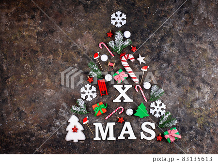 Christmas tree made from letters X-MAS and decoration Christmas tree made from letters X-MAS and decoration 83135613