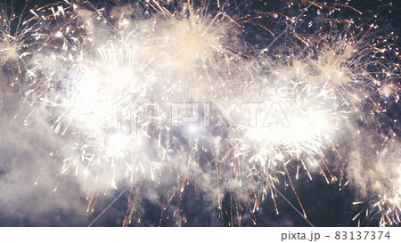 Golden Firework celebrate anniversary happy new year 2022, 4th of july holiday festival. Gold firework in the night time celebrate national holiday. Countdown to new year 2022 gold party time event 83137374