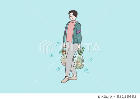 Smiling man with bags grocery shopping in store Smiling man with bags grocery shopping in store 83138483