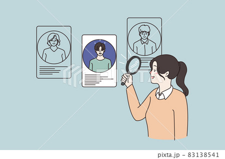 Woman use magnifier lens choose candidates for work position Woman use magnifier lens choose candidates for work position 83138541