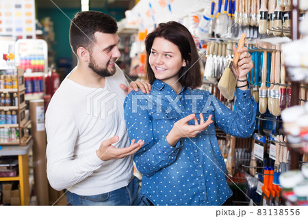 Couple choosing brush for house decoration Couple choosing brush for house decoration 83138556