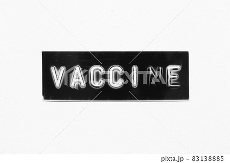 Black color banner that have embossed letter with word vaccine on white paper background 83138885