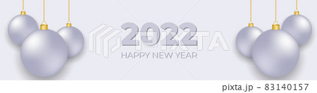 Silver christmas balls hanging on gold chains on a soft grey wide banner 83140157