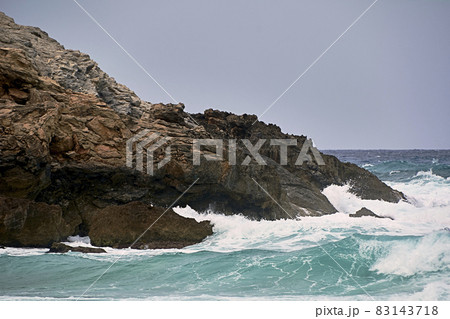 Shore rocks battered by waves. Mediterranean sea 83143718