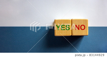 Wood cubes with words 'yes, no' on paper white and blue background, copy space. Business concept. 83144929