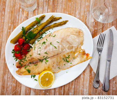 Roasted perch fish fillet with pickled vegetables Roasted perch fish fillet with pickled vegetables 83152731