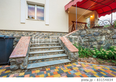 Horizontal view of single-family home with patio Horizontal view of single-family home with patio 83154834