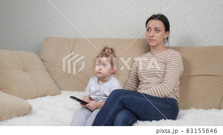 Switch the transmission on the channel with the remote control, control the TV, find out bad news in the media, a mother and little daughter watch the news, get upset when they learn the truth about a 83155646
