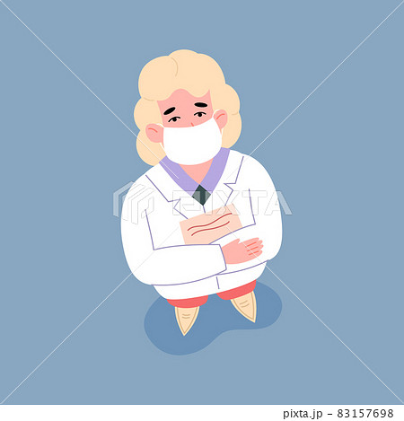View from above on female doctor in medical facial mask and white coat looking up 83157698