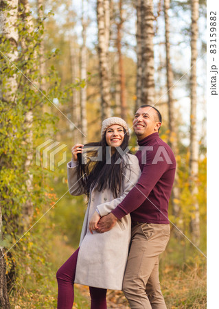 Lovely couple having fun together in nature. Lovely couple having fun together in nature. 83159882
